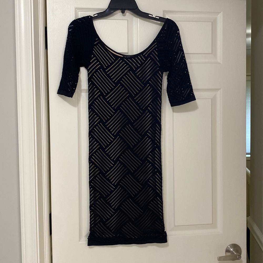 BEBE spandex mini dress with nude lining